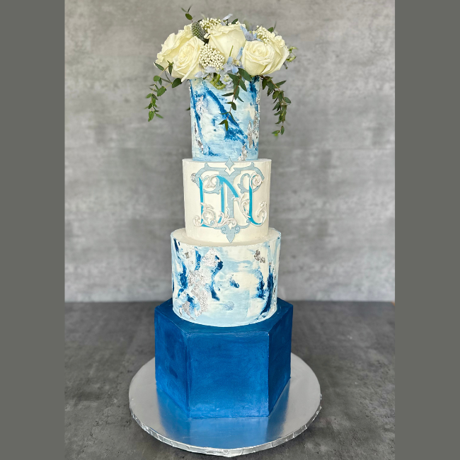 Wedding Cake blue with flowers on top
